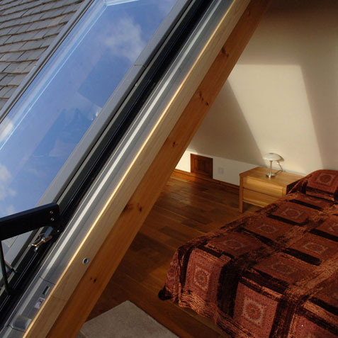 Loft conversion bedroom from balcony
